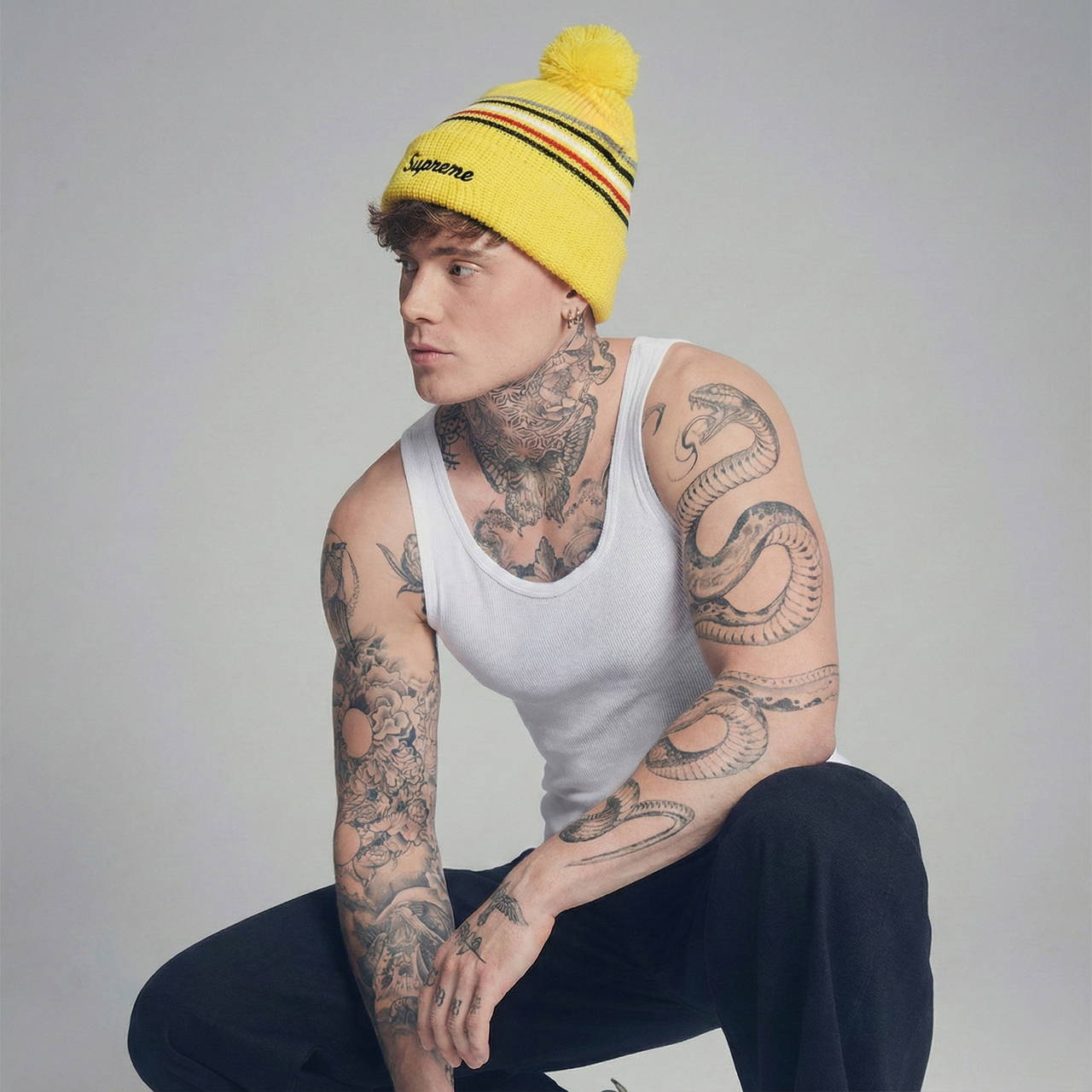 Шапка Supreme Loose Gauge Stripe жёлтая с помпоном